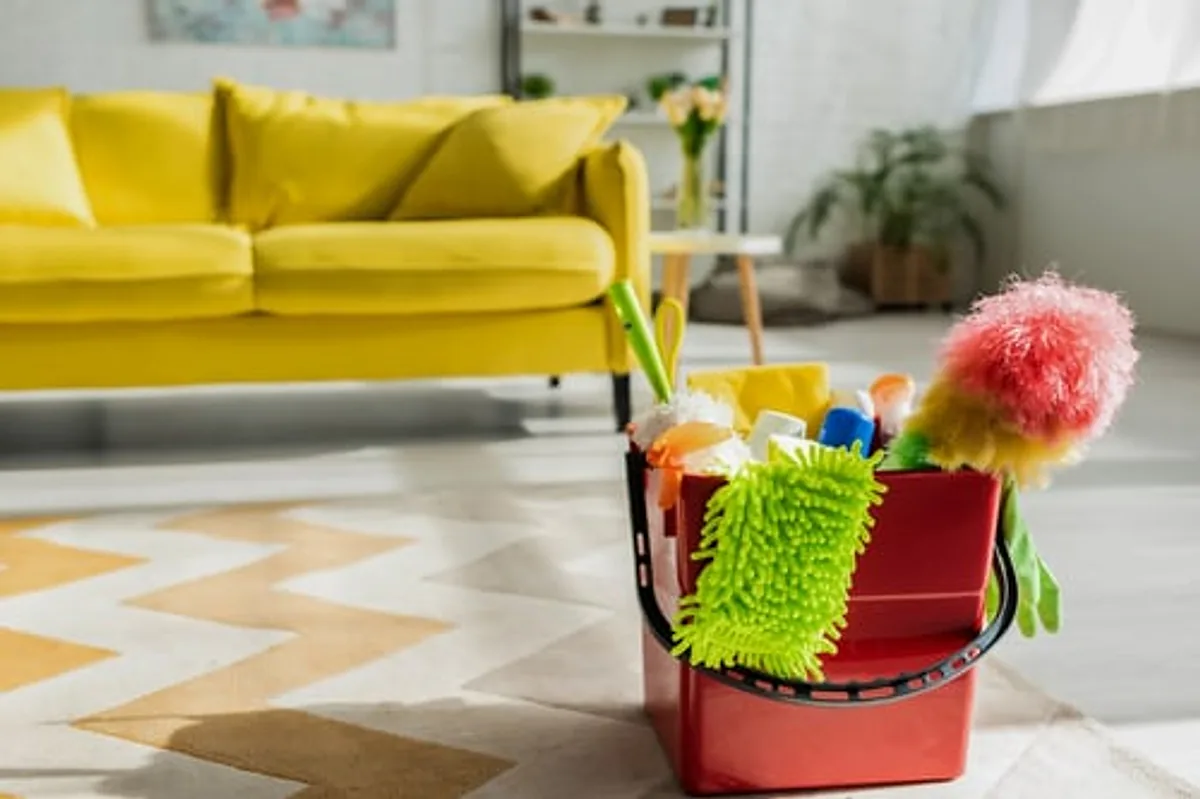 Bright living room with cleaning supplies after a professional house cleaning in Philadelphia